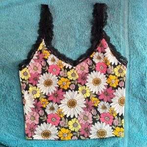 From Forever 21, different color flowers crop top. Size small , mostly new.